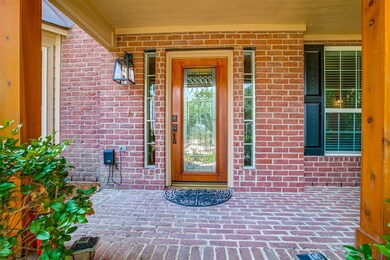 Beautiful front entry w/cedar posts.