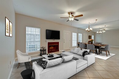 Open floor plan features living/dining area with p