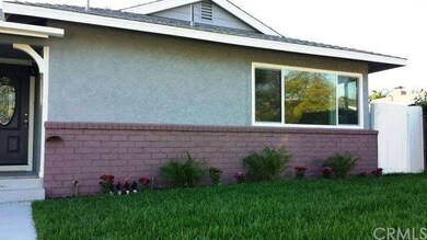 Front right of the house.  Updated with palms and 