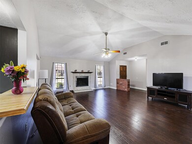 The fireplace was recently rebuilt and retiled.