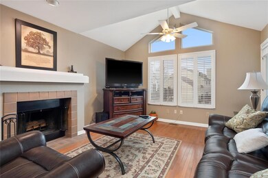 Vaulted ceilings and hardwood floors throughout ma