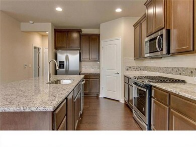 Kitchen with appliances with stainless steel fini
