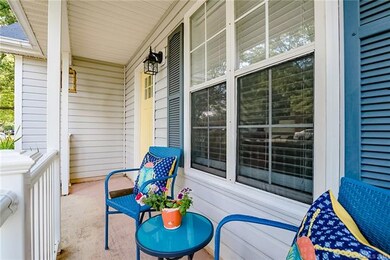 Enjoy a beverage and relax on your front porch mor