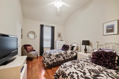 On the opposite side of the entry hall, you will find another large bedroom with walk in closet.