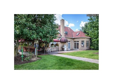 Large stamped patio and sidewalks with an elegant 