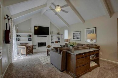 Huge Great Room w/vaulted ceilings, fan, fire plac