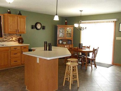 Dining Room. dining area overlooking deck and rear