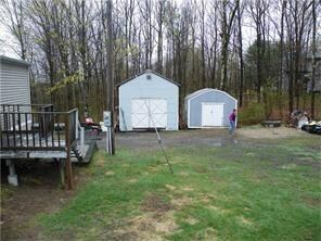 Two of the three sheds that will remain