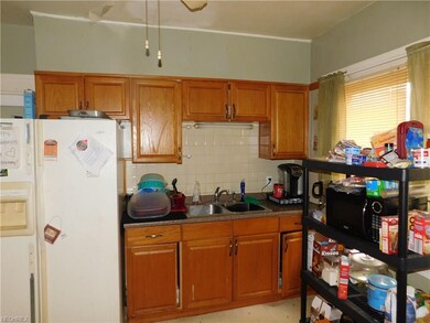 Down.stairs kitchen. Refrigerator and stove stay