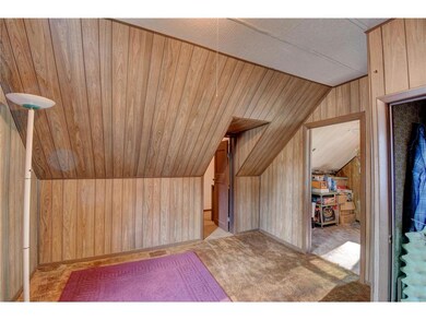 Another view of the main bedroom with the door goi