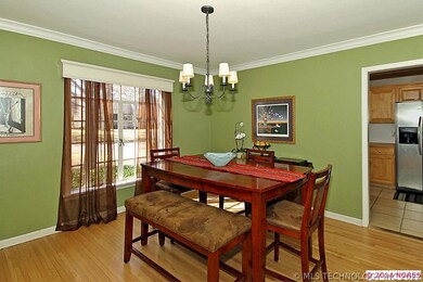 Dining room with hardwoods and updated paint
