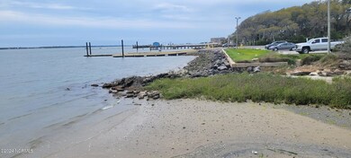 adjacent to the boat ramp