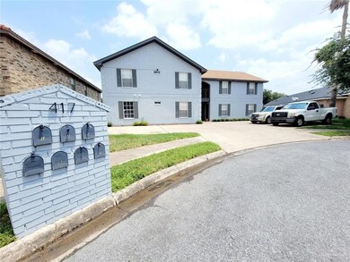 View of front of house featuring brick siding
