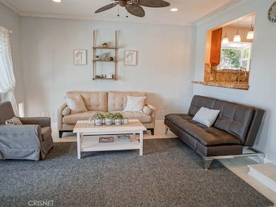 Off the living room\ with the pass through to the kitchen