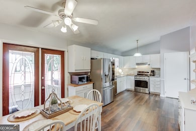 Kitchen with new flooring and granite countertops