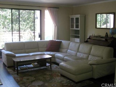 Living Room overlooking Private Patio