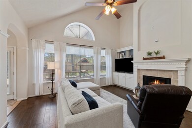 Hardwood floors, soaring windows and ceilings as well as a fire place to utilize on those cold winter days.
