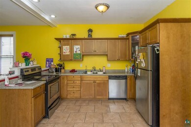 newer cabinets, stainless electric stove, dishwash