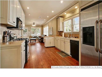 Updated kitchen open to living room and dining roo