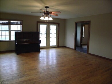Family room features French doors to back yard and