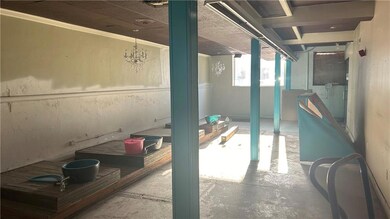 Suite 1B on right side of building