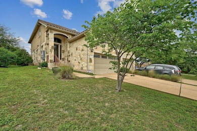 Mediterranean / spanish home featuring an attache