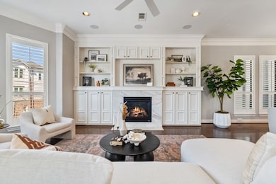 On the second floor, you'll find the open concept kitchen, dining, and living spaces with hardwood floors throughout.