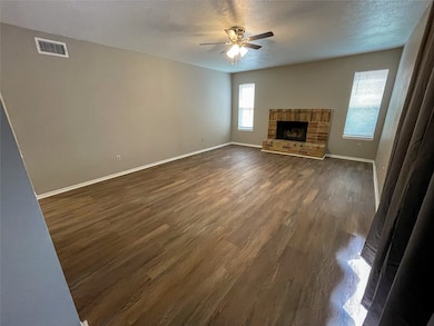 The living room has been updated with new laminate