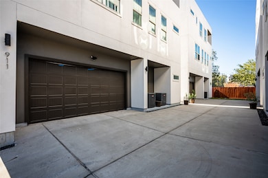 This modern, multi-story home features a sleek des