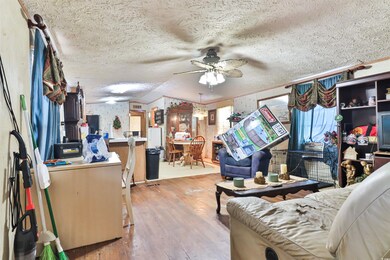 Living room featuring hardwood / wood-style floori