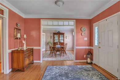 Foyer.  Front door sidelights and transom windows 