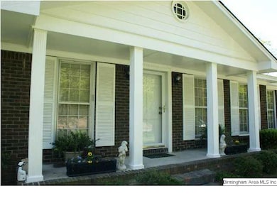 Close view of the Front showing large porch