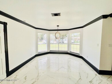 517 Commagere Blvd, Bay Saint Louis, MS 39520 - photo 4