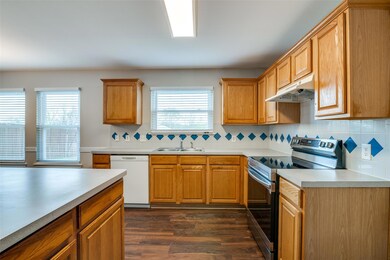 Updated slide-in range, all new blinds on the windows, fresh paint and new floors!