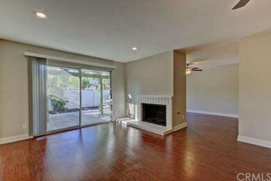 Large living room feature dark wood laminate floor