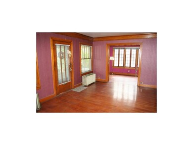 Spacious living room with natural woodwork