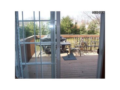 Kitchen patio doors leading out to the deck perfec
