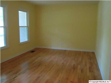 Beautiful living room, new floors, windows and paint!