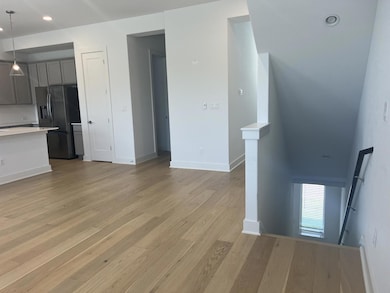 Unfurnished living room featuring recessed lighting and light wood finished floors