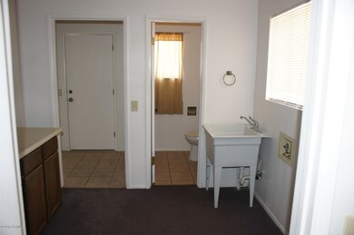 Laundry, bath, entry to bedroom 3