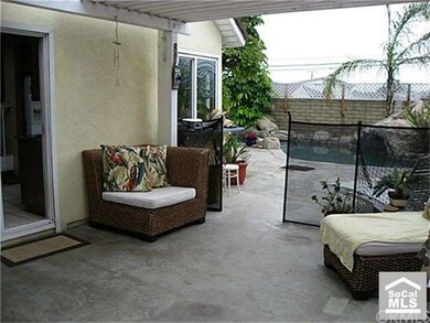 Side patio off the kitchen. Notice the removable f