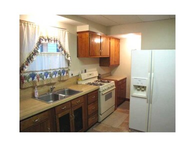 Kitchen. Maple cabinets add a warm glow to the kit