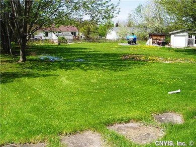 Yard. Yard extends far to the left of the house.