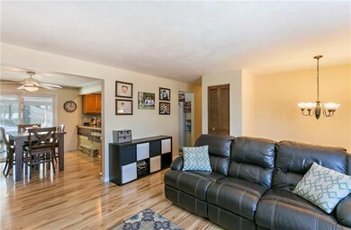 Open concept home.  Living room leading to hall an