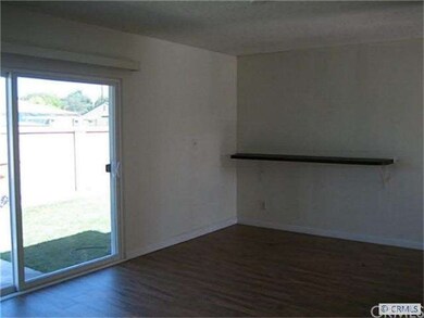 Living room with shelf, new laminate flooring, fre