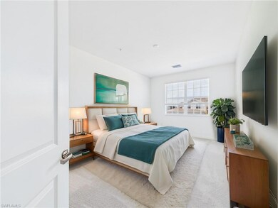 Bedroom featuring carpet floors and visible vents
