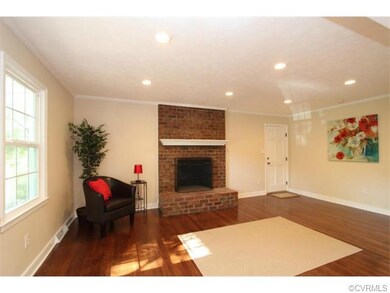 Family Room with recessed lighting, refinished har