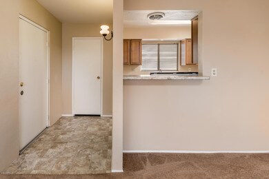 entry and opening to kitchen