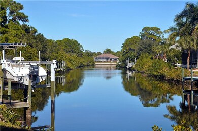 The lot is up on the left approximatley opposite the dock with the boat on the right.
