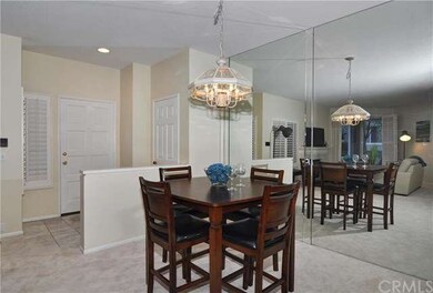 Dining room featuring oversized mirror